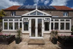 Agricultural barn converted into energy efficient home with Spectus PVC-U